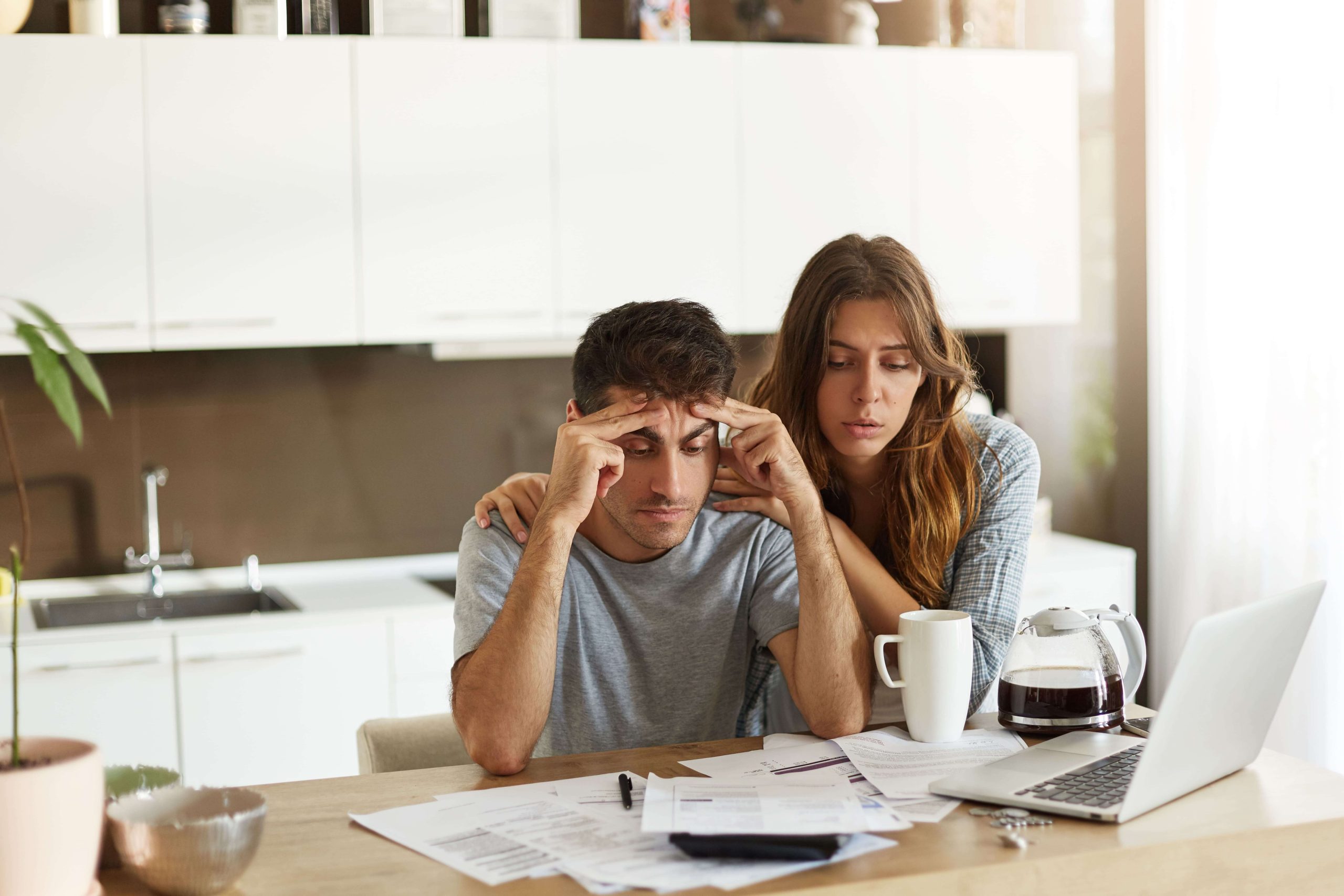 Couple worried about their debts and lack of money